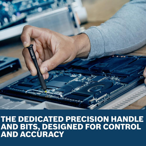 Person using precision handle from Two-In-One 42-Piece Extra Hard Precision And Standard Screwdriver Bit Set on electronic device.
