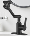 Top Shelf Stainless Steel Bathroom Sink Faucet With Slick Matte Black Finish And Full 1080 Degree Swivel Spout For Smooth Operation And Zero Fuss Installation Setup on modern bathroom countertop.