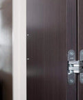 Invisible Hinge For Wood Or Metal Doors, Model 212 By SOSS, Satin Chrome Finish, Zinc Body With Steel Pins, installed on dark wood door