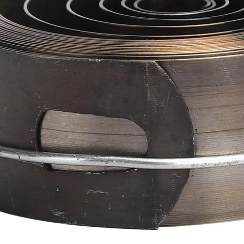 Close-up of Copper Main Watch Spring Replacement Part, durable 1.93 inch, oxidation resistant copper, for DIY pros and watchmakers.