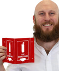 Person holding a Projecting Fire Extinguisher Sign With Down Arrow, Two Sided Wall Mount Corridor V Sign, Polished Acrylic White On Red, 5 By 6 Inches.