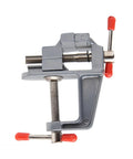 Rock Solid Mini Bench Vise clamp on tabletop tool showcasing heavy duty 45 steel jaws and slick coating for woodworking.