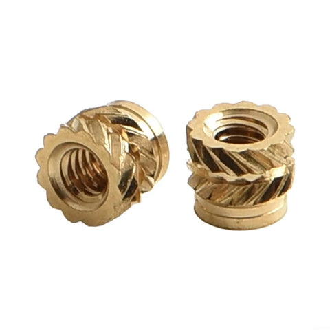 Top Tier Brass Knurled Heat Set Threaded Inserts For 3D Prints And Thermoplastics close-up showing unique knurled design and threaded interior.