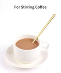 Gold Tone 6.7 Inch Long Handle Coffee And Tea Spoon in white cup with coffee, showing stirring use, stainless steel, mirror finish