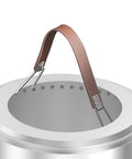 Image of Heavy Duty Fire Pit Carrying Handle With Heat Resistant Stainless Hooks And Durable PU Strap, attached to a fire pit.