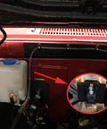 Universal 12V Windshield Washer Pump Kit With Fluid Reservoir Bottle Jet Nozzle Switch installed in a vehicle hood