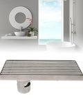 Oreilet Linear Shower Drain Bathroom Floor Drain with Hair Catcher (Side) in stainless steel with striped design for effective drainage.