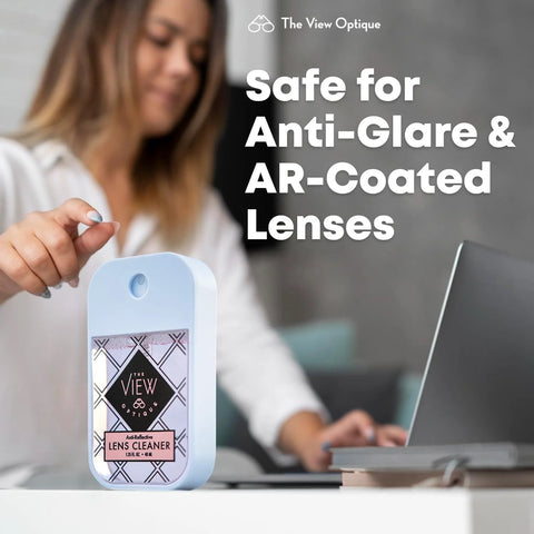 The View Optique lens cleaner spray, 1.35 oz, light blue plastic for eyeglasses, camera lenses, and screens.
