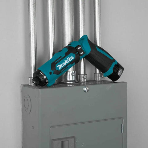 7.2V Cordless Hex Driver Drill Kit with Auto Stop Clutch and LED Battery Charge Indicator resting on metal pipes