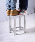 Two people standing on sturdy 304 stainless steel square stool for factory lab and workshop use dust free and easy to clean trapezoidal frame.