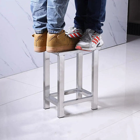Two people standing on sturdy 304 stainless steel square stool for factory lab and workshop use dust free and easy to clean trapezoidal frame.