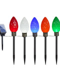 Solar-powered outdoor garden lights with colorful LED bulbs on stakes, showcasing solar panel and vibrant colors against a white background.