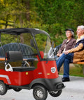Electric Mobility Scooter For Adults Packing 800W Brushless Power And 12Mph City Speed with large cargo trunk near parked couple.
