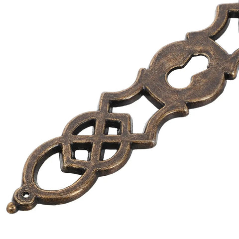 Decorative zinc alloy piece from Old School Antique Clock Hardware Kit With Door Key Hinges And Cylinder for DIY Grandfather Clock Restoration.
