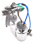 Pro Grade Pressure Feed Spray Gun With Dual Nozzles For Silky Smooth Coatings And Crisp Edge Lines features polished metal, 34 oz pot, and dual nozzle setup.