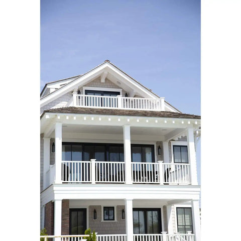 Rock Solid Cellular Pvc Deck Railing Kit With Aluminum Reinforcement 42 Inch High 120 Inch Long Pro Grade Balusters in use on a balcony.