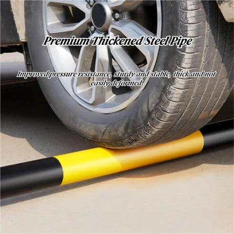 Built Like A Tank Full Weld Steel Driveway Guard And Warehouse Safety Barrier With U Shaped Floor Mount Design Using Thickened Reinforced Pipes That Handle Heavy Traffic Like A Boss Protect Your Garage Space Without Worries Ever, with tire on yellow and black thickened steel pipe.