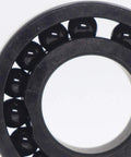 Close-up of Dead Serious High Temperature Chrome Steel Full Ball Bearings 50X80X10mm TB16010 showcasing black balls.