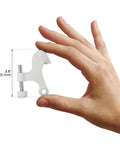 Person holding one of the Five Pack Heavy Duty Hinge Pin Door Stop in White for Slam Proof Door Control, measuring 2.5 inches
