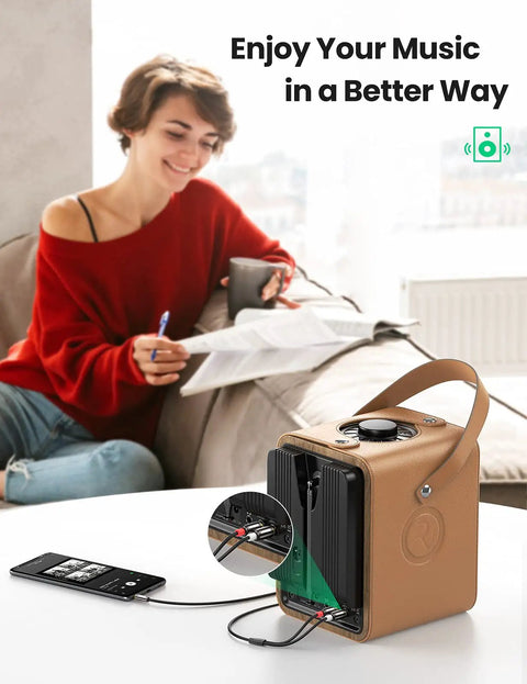 3.5mm To RCA Audio Cable 6.6 Feet 2RCA Male To Aux Adapter For Crisp HiFi Sound, Great For Plugging Your Phone Or Tablet Into Home Theater, Speaker System, Or Car Stereo Perfect For Any Setup At Home Or On The Road. Phone connected to portable speaker with 3.5mm to RCA cable