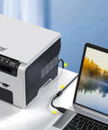 Heavy Duty 10 Ft Usb A To Type B Printer Cable Bringing Dead Simple Hookups With No Nonsense Reliability And Smooth 480Mbps Data Transfer For Every Printing Station On The Block Black Cord connecting printer and laptop.