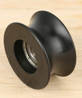 Close-up of a black U groove pulley wheel from the Heavy Duty 4 Pack U Groove Pulley Set With Guide Wheels.