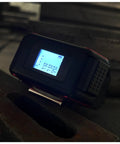 Two In One Laser Tape Measure With Level And Backlit LCD 131 Ft Laser Distance Meter 16 Ft Auto Lock Tape Ft In Fractions Mm Red on metal surface