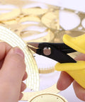 Two Pack Mini Flat Nose Pliers Nippers DIY Tool Set for 3D metal model kits, yellow handle cutting intricate metal piece.