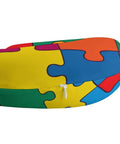 Close-up of the Lightweight U Shaped Neck Pillow With Washable Cover For Travel And Office Naps, Autism Awareness Colorful Puzzle Design.