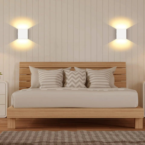 Bedroom with Cord Free Battery Powered Wall Sconce With Touch Dimmer, Rechargeable LED Wall Light In Black, emitting warm white glow