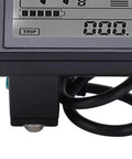 Close up of Beefed Up Electric Bike LCD Display Meter Waterproof Speedometer, showing trip data and cables for ebike control panel.