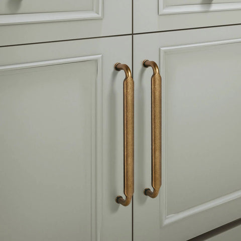5 Inch Hole Center Antique Brass Cabinet Pulls Zinc Alloy Kitchen Drawer Pulls installed on white cabinet doors