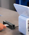 USB 4 In 1 Magnetic Card Reader And Writer With Contactless PSAM And Chip Card Support Read And Write APDU Commands Windows Compatible Plug And Play For Pros on a countertop processing a card.
