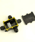 Heavy Duty Waterproof Electrical Junction Box Ip68 Rated Outdoor Cable Management Hub With Quad M20 Grommets For Wiring Jobs 4 To 12 Millimeter Diameter Black Housing, open view with grommets.