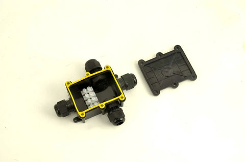 Heavy Duty Waterproof Electrical Junction Box Ip68 Rated Outdoor Cable Management Hub With Quad M20 Grommets For Wiring Jobs 4 To 12 Millimeter Diameter Black Housing, open view with grommets.