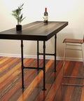 Industrial Pipe Table Leg Set 38 Inch By 14 Inch H Shape Iron Base For Bar Height Pub Tables Desks Nightstands DIY Wood Projects Heavy Duty Build For That Boss Industrial Vibe 2 Pack supporting a wooden bar table and stool.
