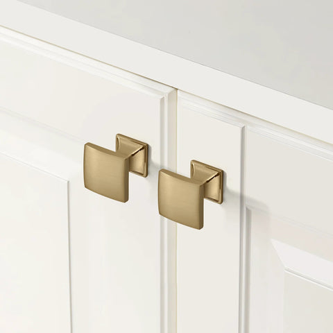Champagne bronze cabinet pulls installed on white cabinets for modern kitchens, part of the 2 Pack 12 Inch Cabinet Handles set.