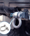 Close-up of a 1/4 inch screw pin anchor shackle attached to a vehicle, part of a Six Pack 6mm Screw Pin Anchor Shackles set.