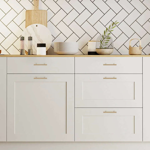 Top Shelf Champagne Bronze Kitchen Cabinet Handles Three Quarter Inch Center Six Inch Long Five Pack heavy duty stainless steel pulls on white cabinets.