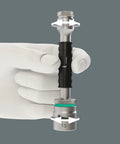 Zyklop 8796 LA Long Extension One Quarter Inch Square Drive 150mm Length shown in hand demonstrating freewheel sleeve.