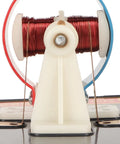 Close-up of Super Chill DIY DC Electric Motor Model Kit's copper coil and white base, ideal for STEM projects.