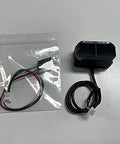 LiDAR Module For Drones And Robotics With 12 Meter Range IP65 Waterproof And Flexible UART I2C IO Interfaces For Pixhawk Arduino Raspberry Pi And Industrial Automation High Precision 0.1 To 12 Meters With 5 Cm To 1 Percent Accuracy shown with cables on table.