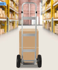 Rugged Aluminum Folding Hand Truck And Rolling Dolly Cart With 500 Pound Capacity and 10 inch pneumatic tires with a box.