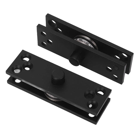 Front view of black concealed door hinge plates with roller pivots; two-piece metal hinge set with multiple screw holes