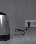 Heavy Duty Stainless Steel Torsion Springs Kit For Repairing 4 Kettle Lids Perfect Fix For Broken Hinges And Lid Handles Keeps Your Teapot Running Smooth And Ready To Brew Anytime You Need A Fresh Cup Of Tea Without Replacing The Whole Thing. stainless steel springs beside electric kettle