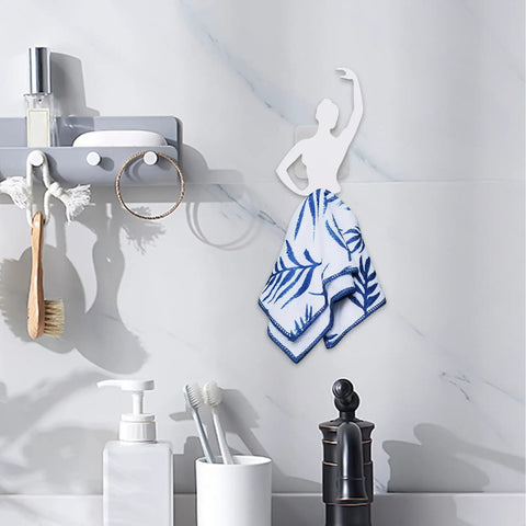 Kickass Sticky Wall Hooks Featuring A Snazzy Ballet Design delivering rock solid hold for a towel in a bathroom setup.