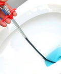 Using 2 In 1 Magnetic Pickup Tool And Grabber Set With 35 Inch Flexible Claw in a toilet bowl to retrieve items.