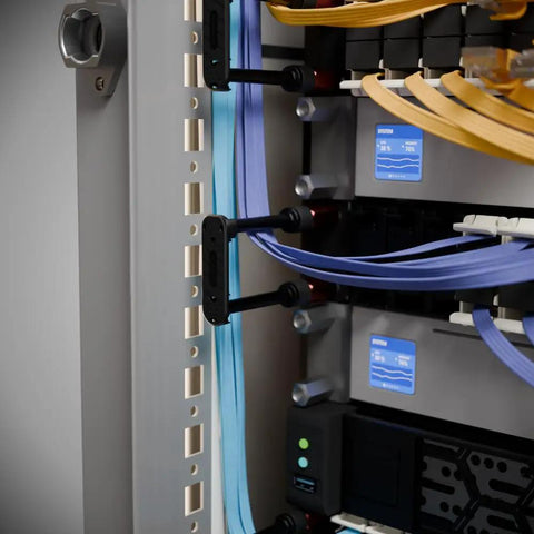 Super Slick Zero U Cable Management For 19 Inch Server Racks offers tidy organization with colored cables in server enclosure.