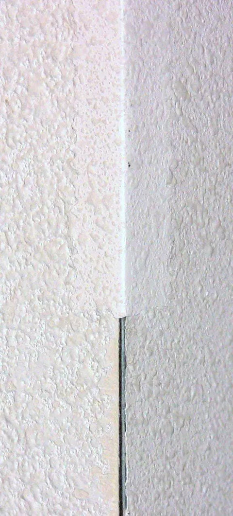 Self-Adhesive Stress Crack Tape 1.25 Inch By 12 Foot Textured Roll applied on corner wall plaster crack repair