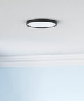 LED Flush Mount Ceiling Light 18W 180W Equivalent Slim Black Fixture, 8.9 Inch, installed on ceiling in a bright room
